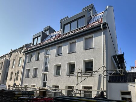 Aufstockung eines Mehrfamilienhauses